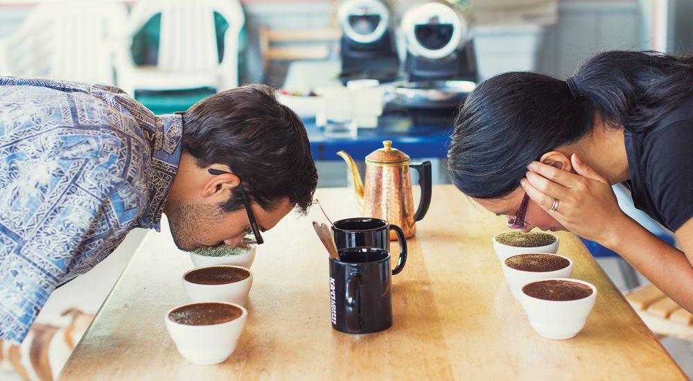 Miguel Meza & Lorie Obra of Rusty's Hawaiian Cupping Coffee (How Experts Taste Coffee). Photo, Joshua Fletcher